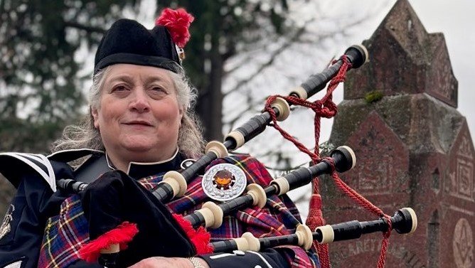Bagpiper Bev York performed for the event.